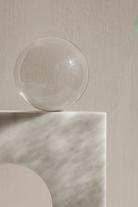 Kaboompics - Clear Sphere Behind Ribbed Glass Panel