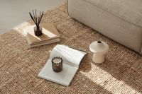 Kaboompics - Neutral Living Room Flat Lay with Books, Reed Diffuser and Sculptural Vases
