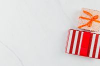 Kaboompics - Striped Red Gift Box and Polka Dot Present on Marble