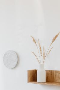 Kaboompics - Pampas Vase on Wooden Shelf with Round Marble Wall Decor