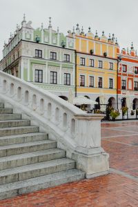 Kaboompics - Colorful Zamość Townhouses Behind White Staircase