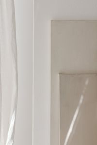 Kaboompics - Sunlit Framed Canvas Beside White Curtains