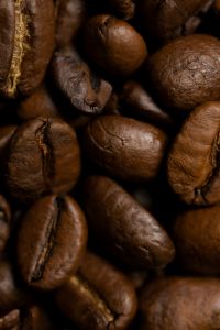 Kaboompics - Extreme Macro of Glossy Dark Roasted Coffee Beans, Espresso and Coffee Texture Detail