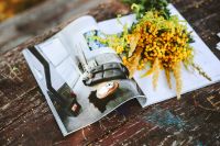 Kaboompics - Yellow flowers on a magazine