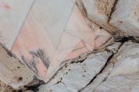 Kaboompics - Geometric Pink Marble Inlay Set into Weathered Limestone