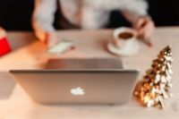 Kaboompics - Christmas Desk Setup with Laptop, Coffee, Gold Tree and Smartphone