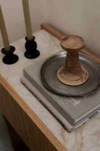 Kaboompics - Wabi Sabi Styling with Wooden Sculpture, Tray and Candles