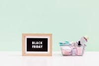 Kaboompics - Black Friday Sign and Shopping Basket with Beauty Products