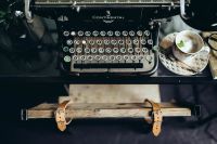 Kaboompics - Retro Typewriter With Blank Paper Ready For Writing