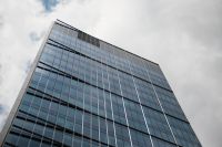 Kaboompics - Glass Office Tower Against Blue Sky