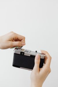 Kaboompics - Hands Operating the Top Controls of an Olympus Trip 35