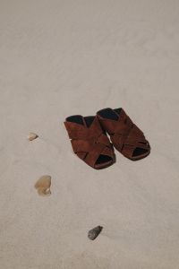 Kaboompics - Brown Leather Sandals on the Beach with Seashells