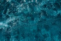 Kaboompics - Wavy water surface in a swimming pool