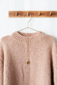 Kaboompics - Sweater on hanger