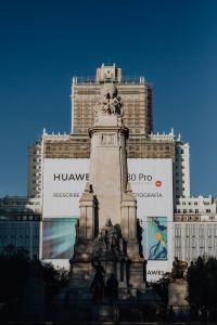 Kaboompics - Madrid Stone Monument and Historic Facade Framed Against Deep Blue Sky