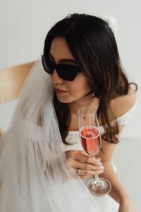 Kaboompics - High-Angle Bridal Portrait With a Veil and Sparkling Pink Drink
