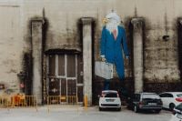 Kaboompics - Businessman Mural and Parked Cars at LX Factory in Lisbon, Portugal, Creative Quarter Street Art