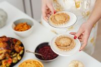 Kaboompics - Two Mini Pumpkin Pies Served on White Plates at Thanksgiving