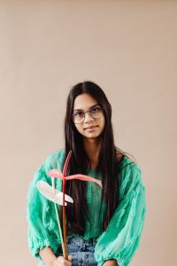 Kaboompics - A Beautiful Young Mixed Race Girl with Anthurium Flower