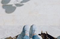 Kaboompics - White Sneakers on Pale Marble Steps with Soft Leaf Shadows, Naples Italy Travel Detail