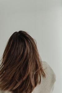 Kaboompics - Close-Up of Tousled Brown Hair with Warm Highlights