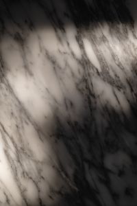 Kaboompics - Moody Arabescato Marble Texture with Light and Shadow