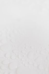 Kaboompics - Minimal White Water Drop Background With Copy Space