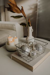 Kaboompics - Silver Christmas Ornaments in a Wire Basket with Candles