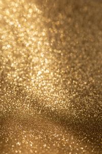 Kaboompics - Soft Gold Glitter Tunnel With Bright Sparkle at the Center
