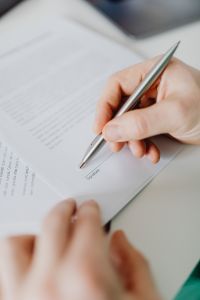 Kaboompics - Close-Up of Hand Writing on Forms