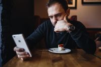 Kaboompics - Young man using his smartphone