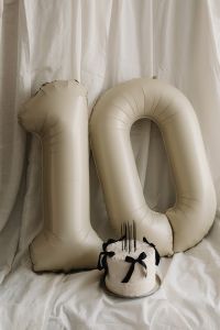 Kaboompics - Inflatable Number Balloons with a Small Celebration Cake