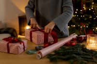 Kaboompics - Christmas Gift Wrapping Table with Evergreen Branches