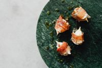 Kaboompics - Gourmet Stuffed Figs On Green Stone Plate
