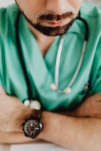 Kaboompics - Doctor Resting Arms With Stethoscope Visible