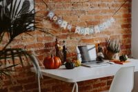Kaboompics - Halloween Home Office Desk With Laptop and Pumpkins