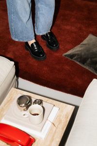 Kaboompics - Feet On Red Carpet Modern Living Room Minimal Interior Detail