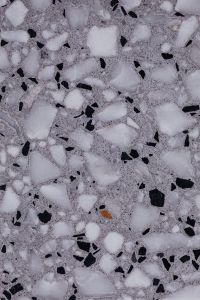Kaboompics - Light Gray Terrazzo Surface with Repeating White Chips and Fine Dark Speckles
