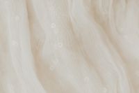 Kaboompics - Ivory Sheer Fabric With Embroidered Details