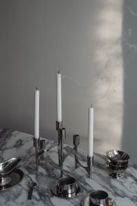 Kaboompics - Chrome Candelabra and Chrome Tableware on Arabescato Marble
