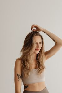 Kaboompics - Woman Touching Her Hair While Looking at Camera
