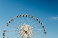 Kaboompics - Close-Up of Gdańsk AmberSky Ferris Wheel Structure Against Blue Sky