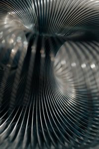 Kaboompics - Abstract Silver Coil Bend with Dark Curved Form