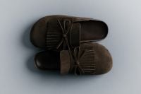 Kaboompics - Dark Brown Fringe Loafers on Blue Background