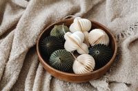 Kaboompics - Close Up of Paper Ornaments in Wooden Bowl