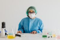 Kaboompics - Female Scientist Portrait in Protective Laboratory Gear