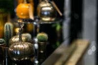 Kaboompics - Golden ornamental pumpkins with cactuses