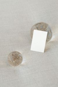 Kaboompics - Close-Up Blank Business Card and Glass Spheres