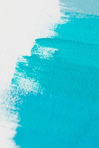 Kaboompics - White Canvas with Textured Cyan Paint Swipes