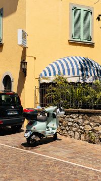 Kaboompics - Mint Green Scooter Outside A Yellow Italian Restaurant